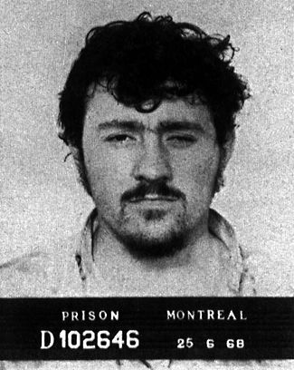 Paul Rose, figure associée à l'enlèvement et à l'assassinat du ministre Pierre Laporte lors de la crise d'Octobre, après son arrestation par les autorités policières